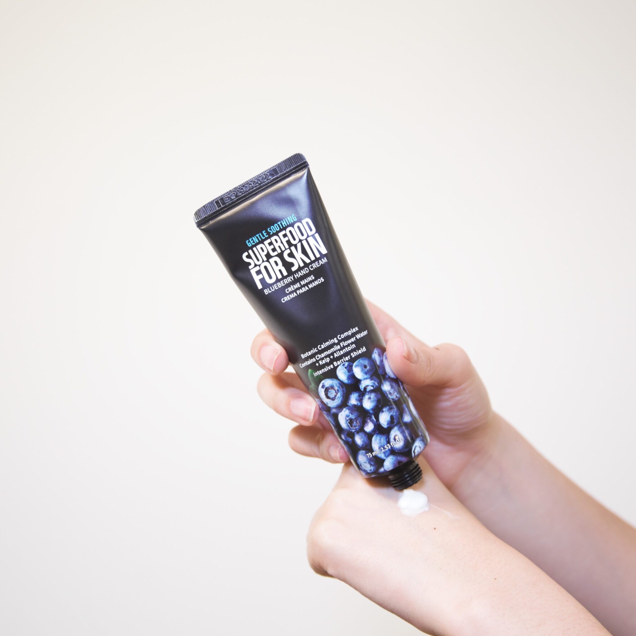 farmskin-superfood-for-skin-hand-cream-blueberry-on-hand